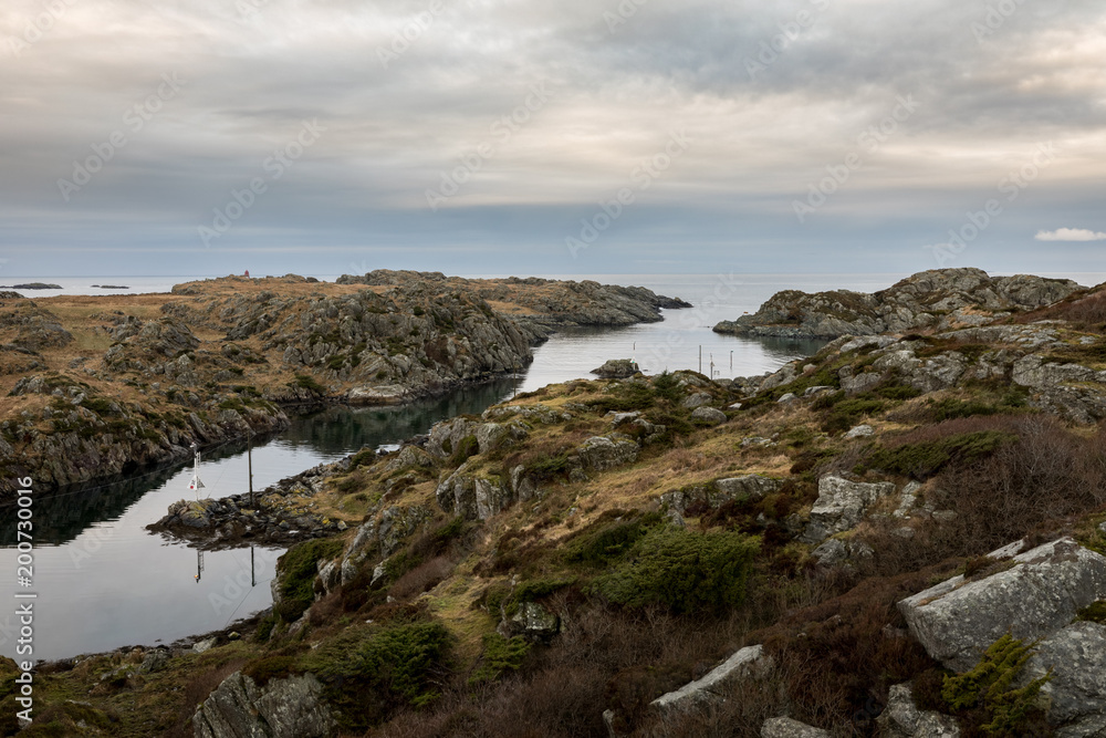 The strait between Rovar and Urd, two islands in The Rovaer archipelago in Haugesund, in the norwegian west coast. The strait between Rovar and Urd, two islands in The Rovaer archipelago in Haugesund, in the norwegian west coast.