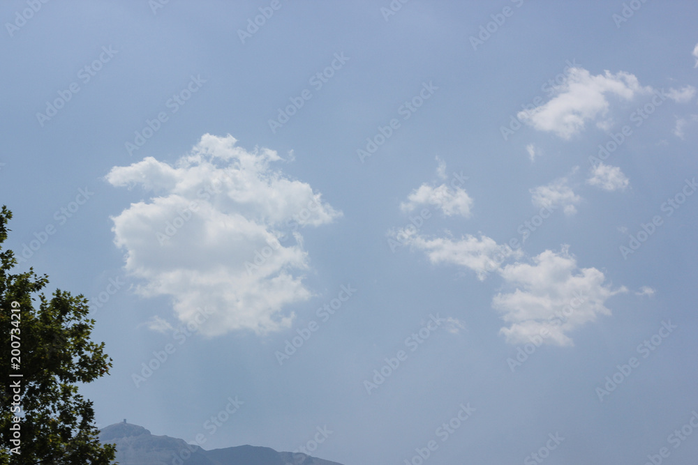 White clouds in the sky are photographed at the height of the flight of the aircraft White clouds in the sky are photographed at the height of the flight of the aircraft