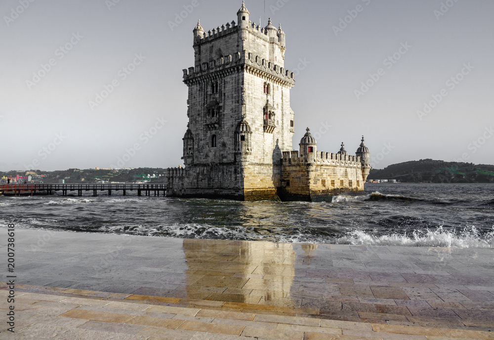 Belem tower and reflection at the riverside of Tejo River