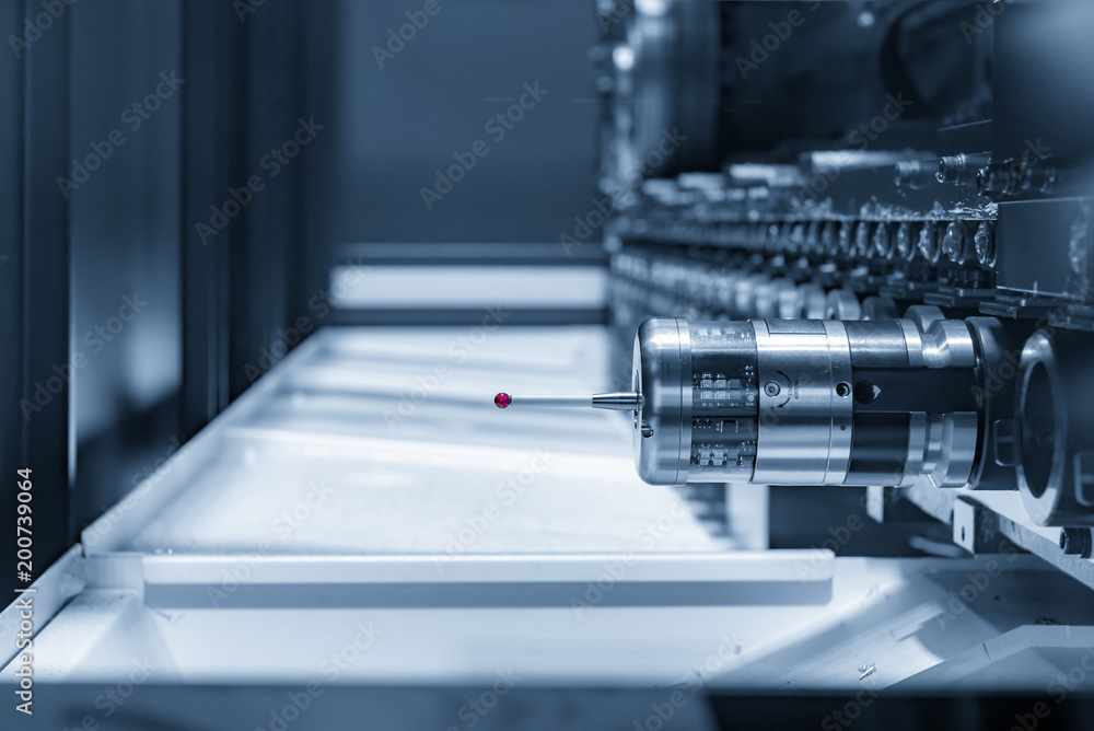 The CMM probe in the CNC machine magazine in the light blue scene. The CMM probe in the CNC machine magazine in the light blue scene.