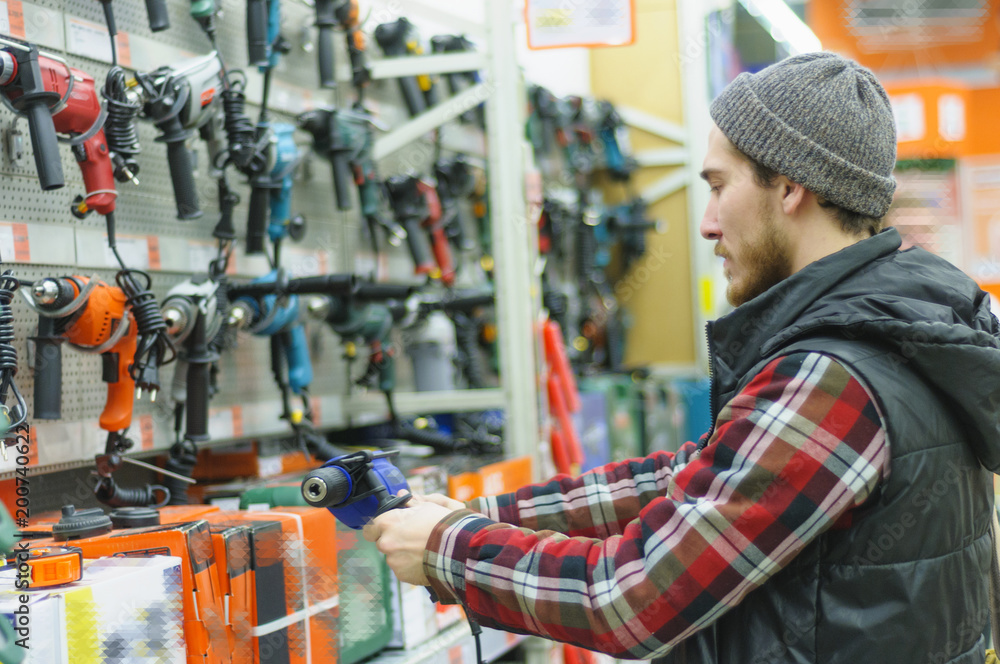 Man in a hardware store Man in a hardware store