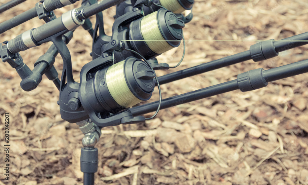 Fishing fairs Rybomania in Poland. Carp rod on the stand.. Fishing fairs Rybomania in Poland. Carp rod on the stand..
