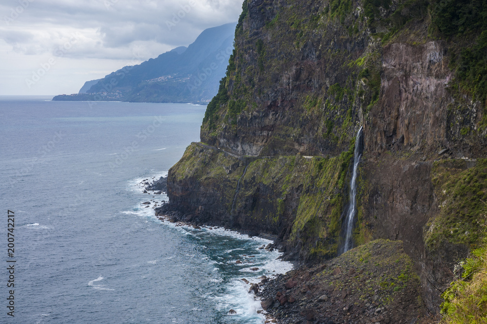 Bridal Veil Falls (Veu da noiva) and the old cliff road North Coast of Madeira island, Portugal