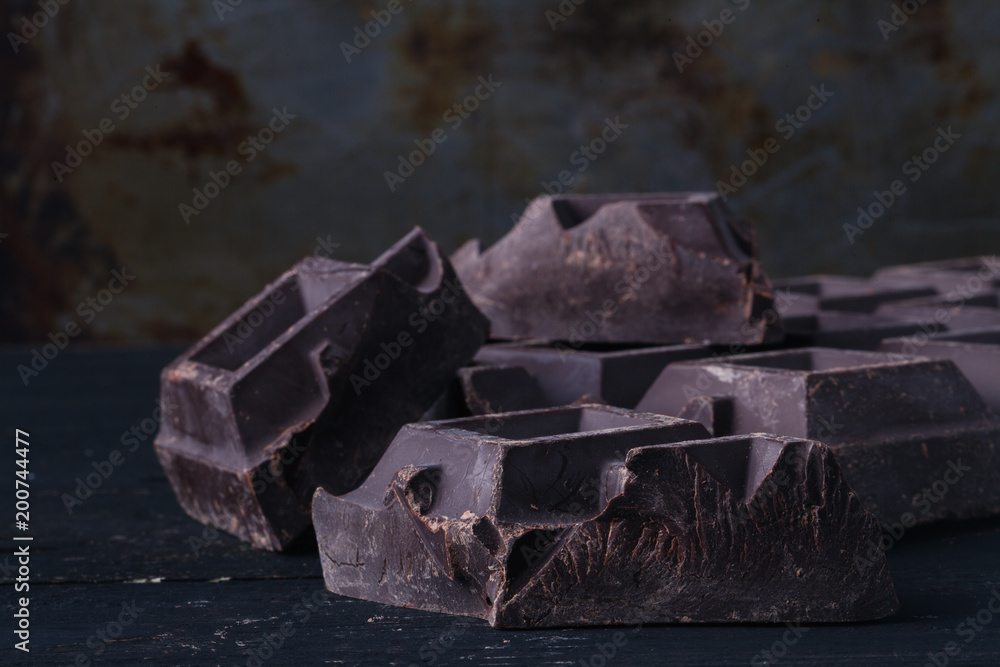Crunch dark chocolat on rustic table