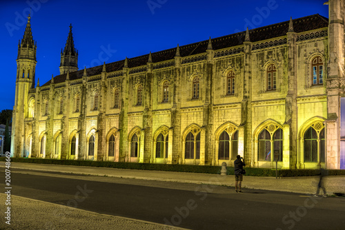 Facade of the Jeronimos (Hieronymites) Monastery in the Belem district of Lisbon illuminated at night