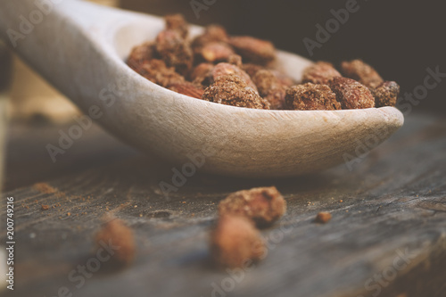 Wood spoon with almond nuts - natural food