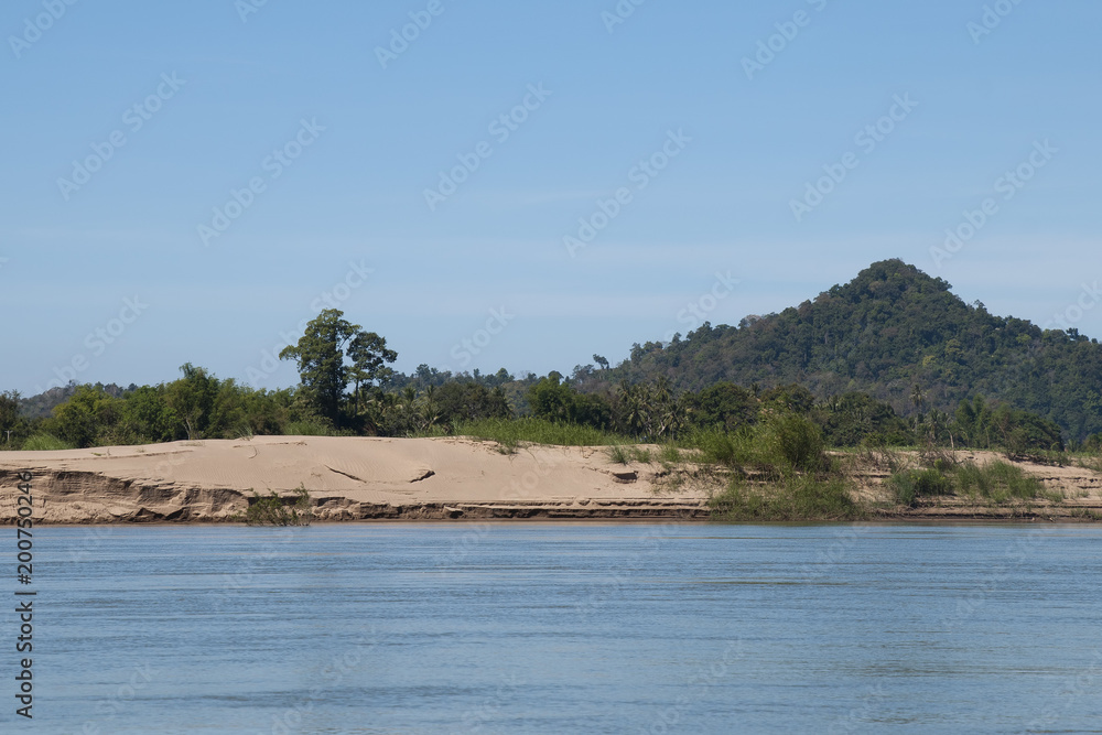 Preah Rumkel Cambodia, sandbar in middle of mekong river