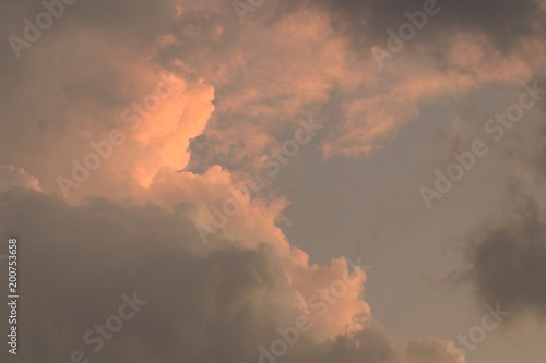 The orange light and clouds in the evening