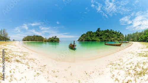 White sand beach and Long-tail boat at Kham-Tok Island  koh-kam-tok   The beautiful sea Ranong Province  Thailand.