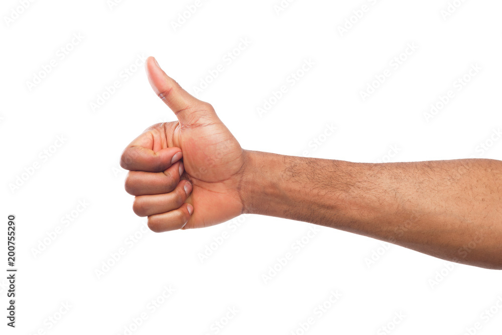 African-american hand making thumb up gesture African-american hand making thumb up gesture