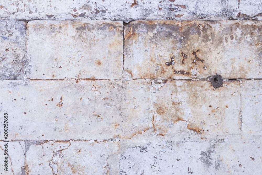 Photo of an old wall with an old brick. Horizontal. Close up Photo of an old wall with an old brick. Horizontal. Close up