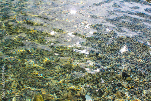 pebble stones into the clean water
