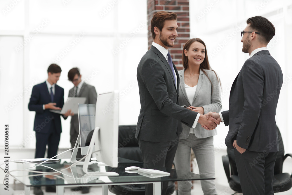 handshake business partners at a meeting handshake business partners at a meeting