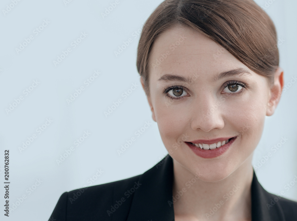 closeup.face of a successful business woman. closeup.face of a successful business woman.