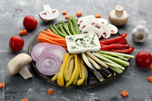 Sliced fresh vegetables on cutting board
