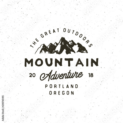 vintage wilderness logo. hand drawn retro styled outdoor adventure emblem. vector illustration
