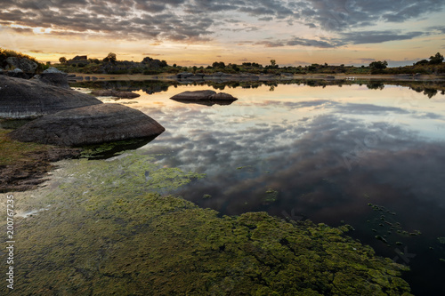 Sunrise in the Natural Area of Barruecos. Malpartida de Caceres. Extremadura. Spain.