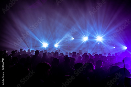 People dancing in lights