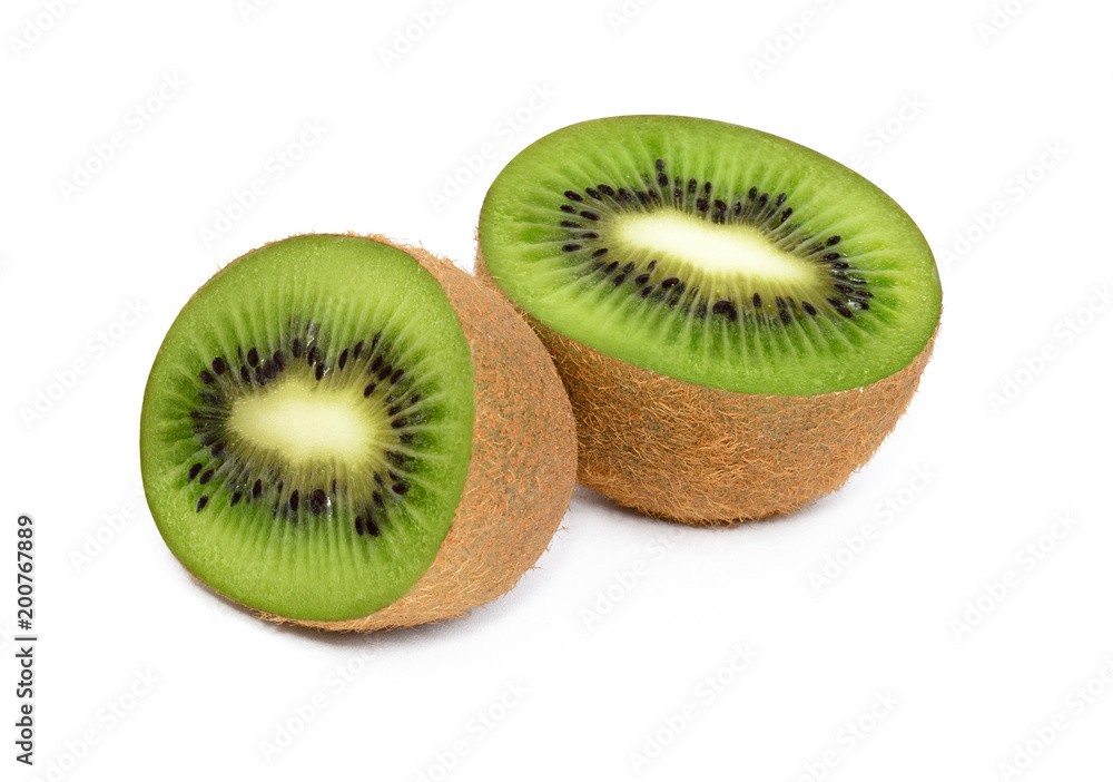 Ripe kiwi isolated on white background. Two cut halves of fruit. Ripe kiwi isolated on white background. Two cut halves of fruit.
