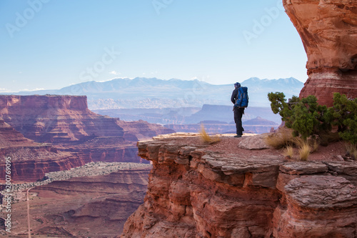 Tableau sur toile Hiker in Canyonlands National park in Utah, USA