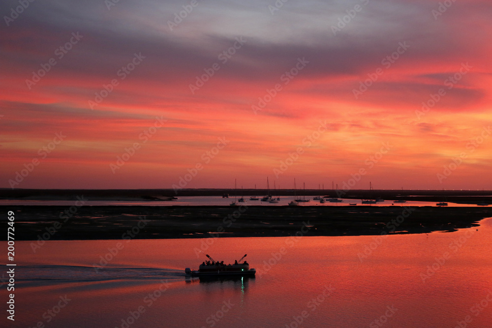 Sunset boat tour in natural park Faro Portugal