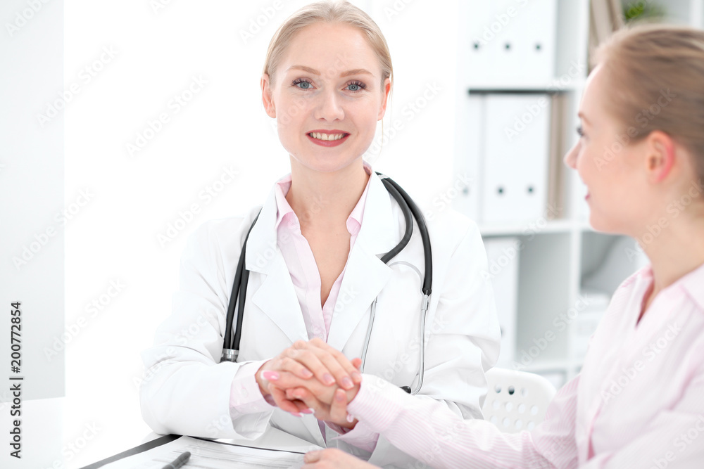 Doctor and patient during personal consulting in hospital Doctor and patient during personal consulting in hospital