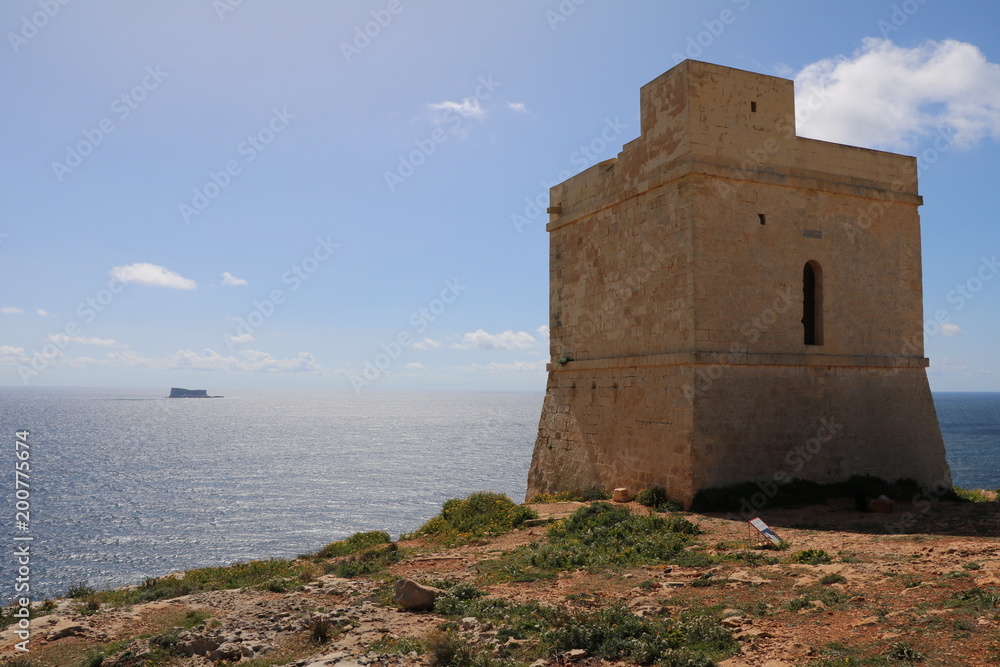 Tal-Ħamrija Coastal Tower at the Mediterranean Sea in Malta