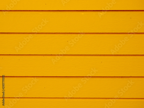 yellow wood panels used as background