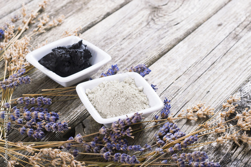 Принти на полотні cosmetic clay powder and mud with dried lavender flowers on old weathered wooden