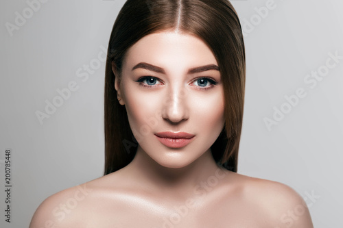 Beautiful woman face with fresh makeup, beauty healthy skin and perfect eyebrows
