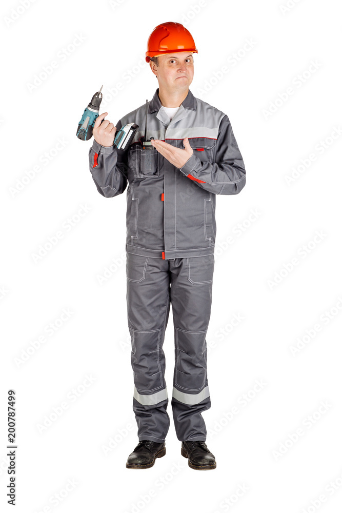 Male builder over white wall background. repair, construction, building, people and maintenance concept. Male builder over white wall background. repair, construction, building, people and maintenance concept.