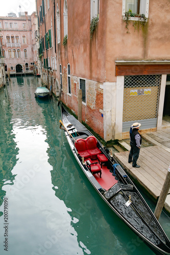 Venice, Italy, Gondolier waiting for the clients © Goran