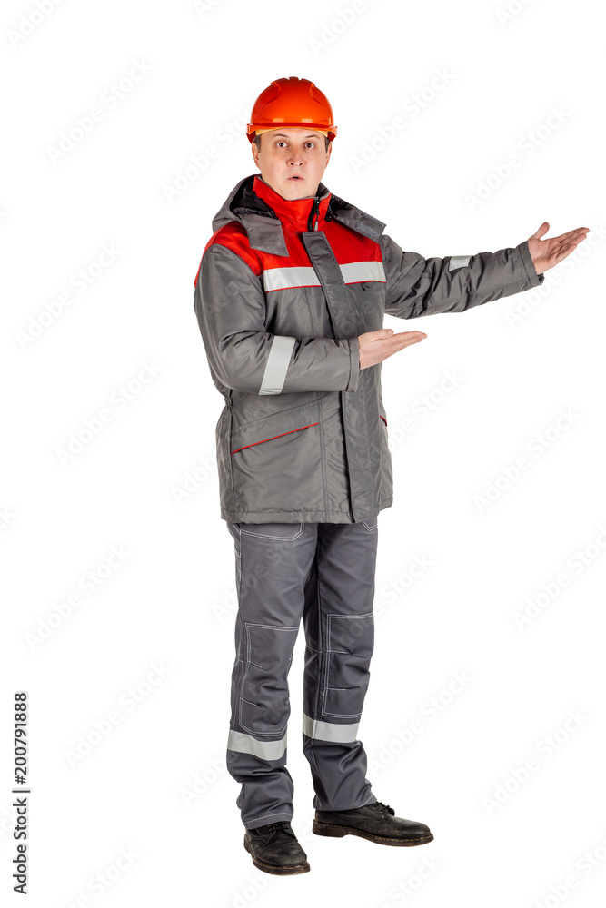 Male builder over white wall background. repair, construction, building, people and maintenance concept. Male builder over white wall background. repair, construction, building, people and maintenance concept.