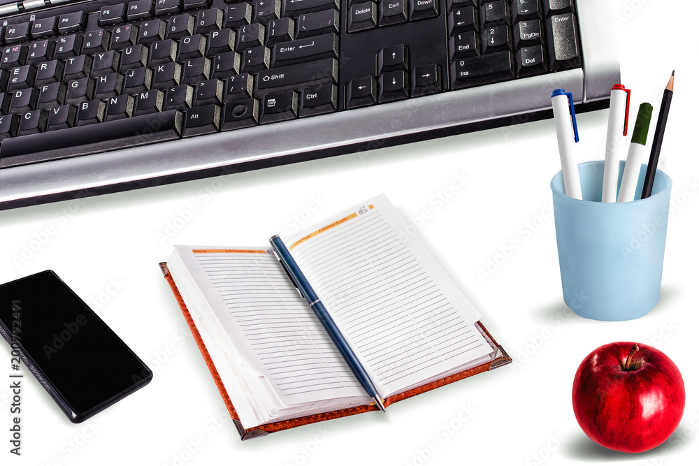 Work place with computer keyboard, smartphone, diary, pen, pencil cup on. Isolated. Work place with computer keyboard, smartphone, diary, pen, pencil cup on. Isolated.