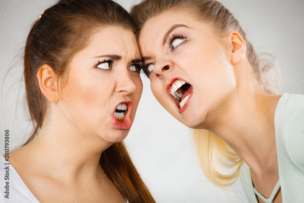 Two agressive women having argue fight Two agressive women having argue fight