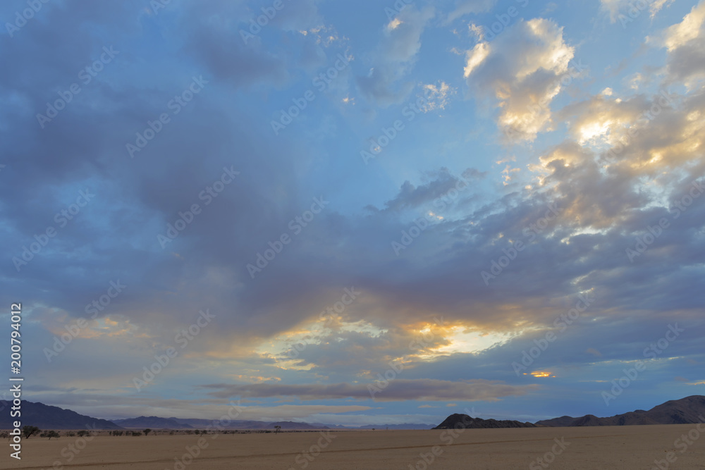 Sunrise color clouds at different altitudes