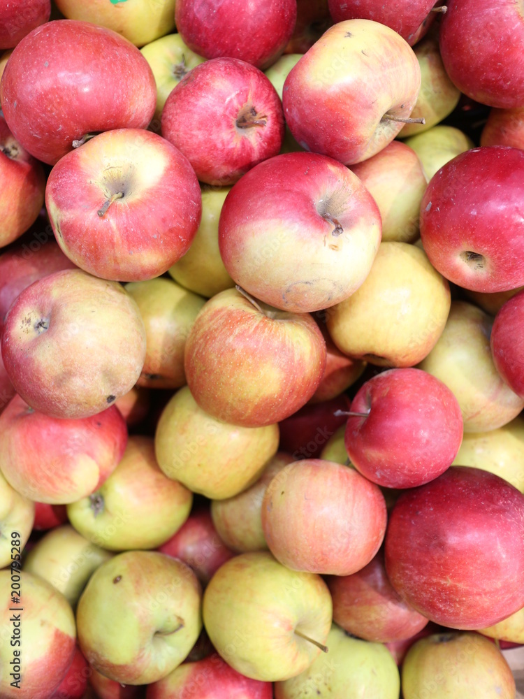 apples in a box in a store