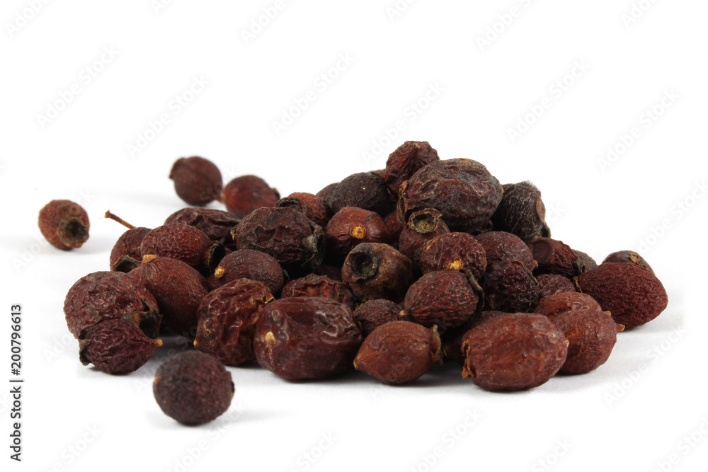 Dry berries of single-seeded hawthorn (Crataegus monogyna) isolated on white. Dry berries of single-seeded hawthorn (Crataegus monogyna) isolated on white.