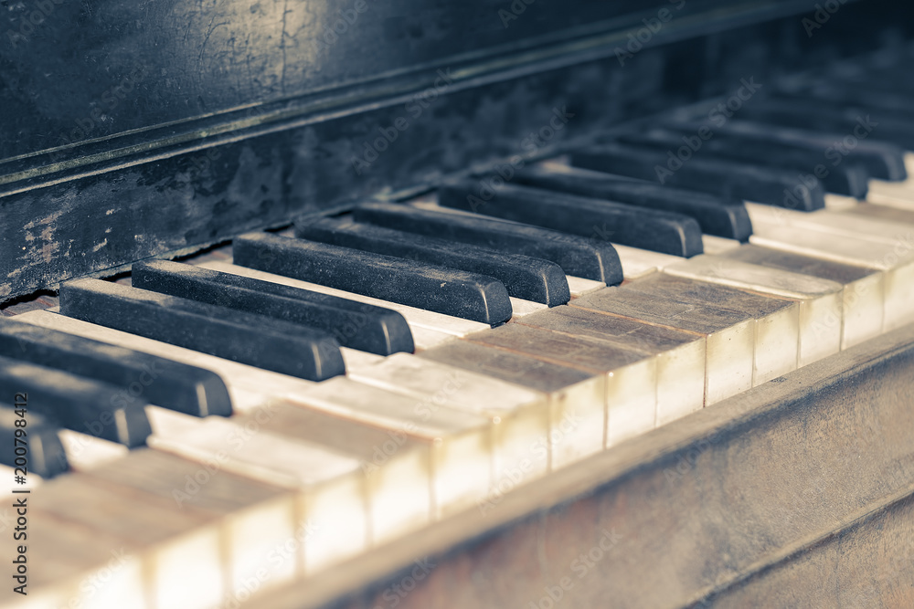 Keys of an old classical grand piano closeup Keys of an old classical grand piano closeup