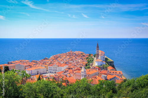 View of the Adriatic Sea and the tiled roofs of Piran, Slovenia photo