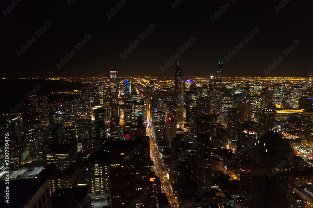 Chicago Skyline aerial view skyscrapers by the beach, night shot
