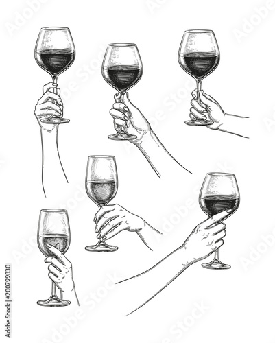 Set of hands with wine glasses