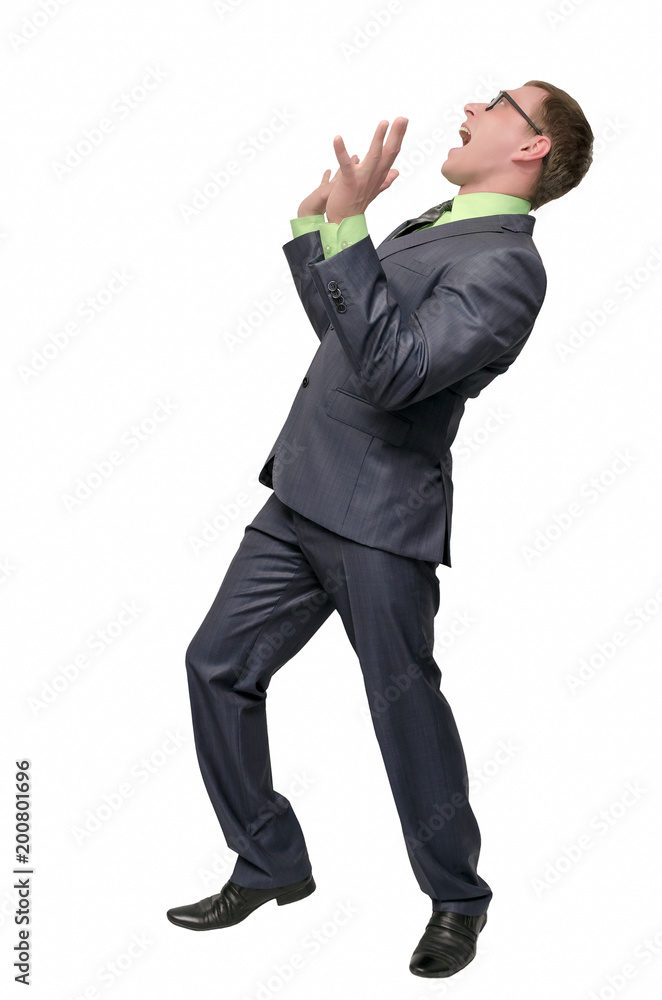Scared businessman looks up, screams with fear and hands over his face isolated on white background. Horrified man. Scared businessman looks up, screams with fear and hands over his face isolated on white background. Horrified man.