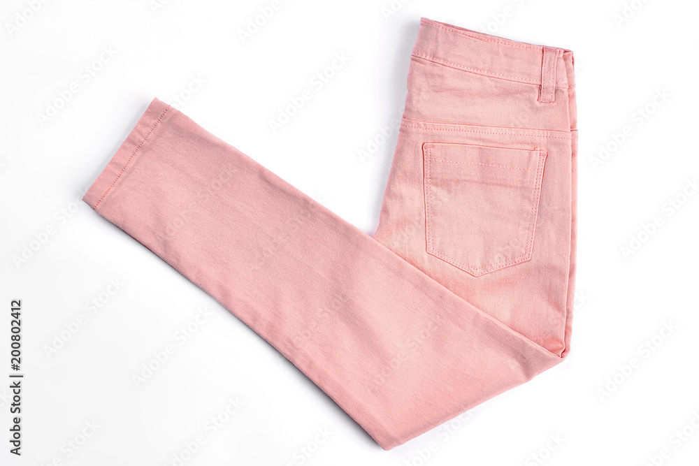 Female casual peach color jeans. Girls new middle waist trousers folded on  white background. Female spring or summer skinny pants on sale. foto de  Stock | Adobe Stock