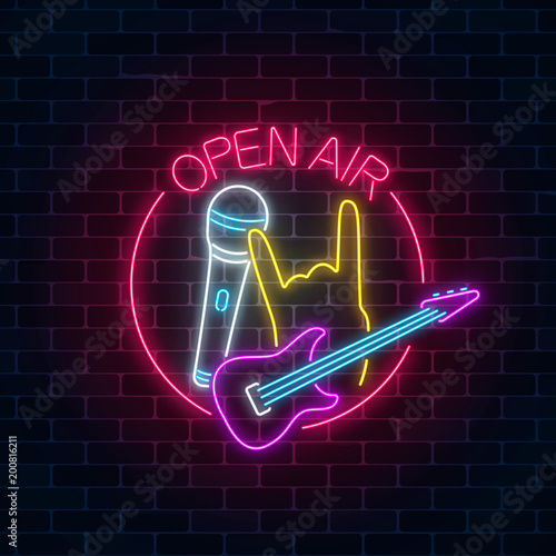 Neon open air sign with guitar, microphone and piece gesture in round frame. Live music in open air icon.