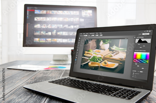 Bilde på lerret Photographers computer with photo edit programs.