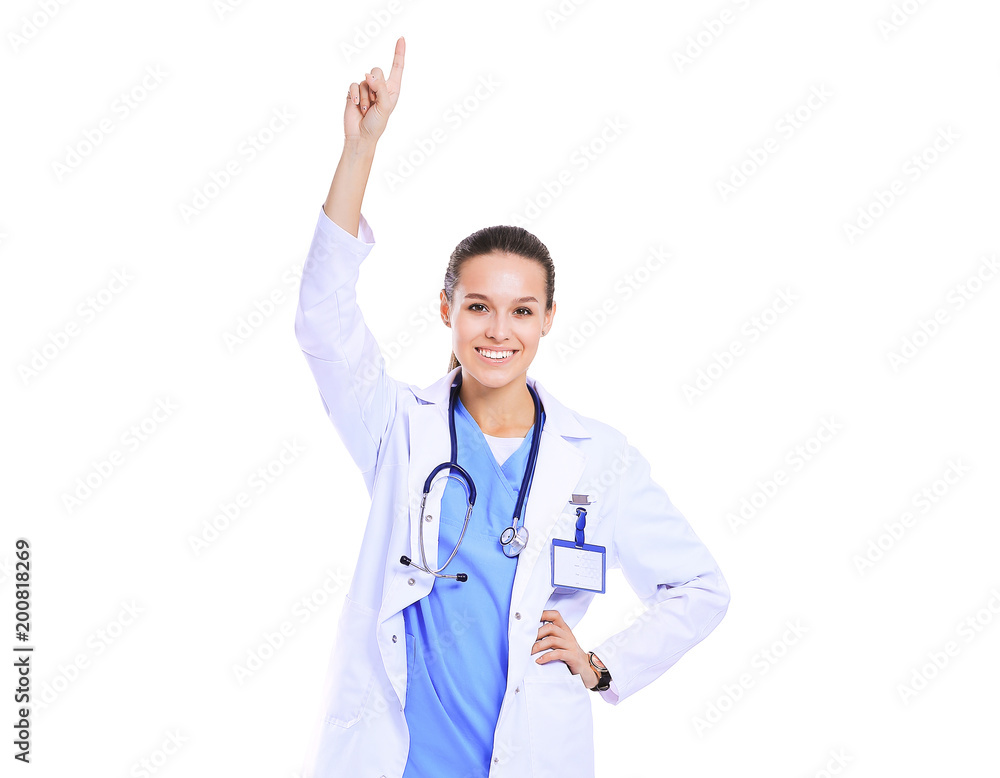 Beautiful young woman in white coat posing with hand in pocket. Woman doctor Beautiful young woman in white coat posing with hand in pocket. Woman doctor