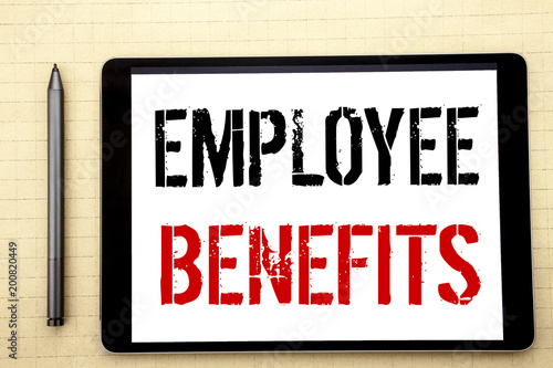 Handwritten text showing Employee Benefits. Business concept writing for Compensation Career Written on tablet computer screen, white background in  office space view with pencil marker