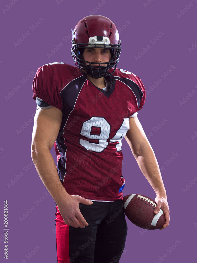 Fototapeta premium American Football Player isolated on colorfull background