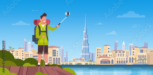 Man Tourist With Backpack Taking Selfie Photo Over Beautiful Dubai City Background Flat Vector Illustration